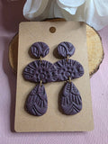 Clay Dark Purple Embossed Tiered Statement Dangle Earrings